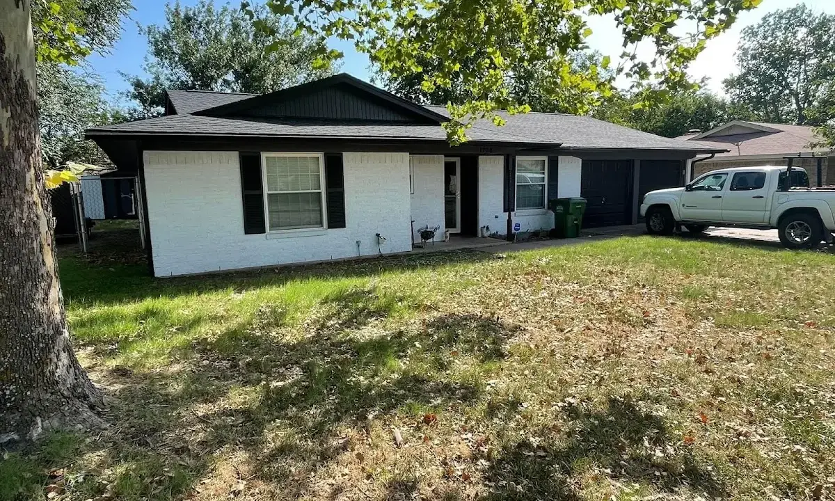 Professional roofing crew working on a residential roof in Jonesborough